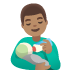 👨🏽‍🍼 man feeding baby: medium skin tone display on Google